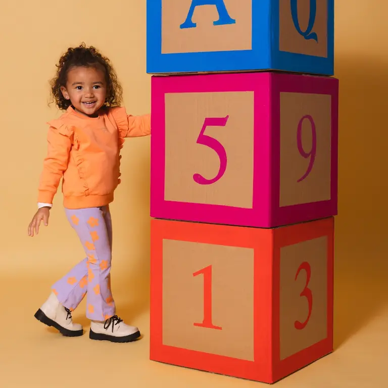 Broekje Marit (aop orange flower)