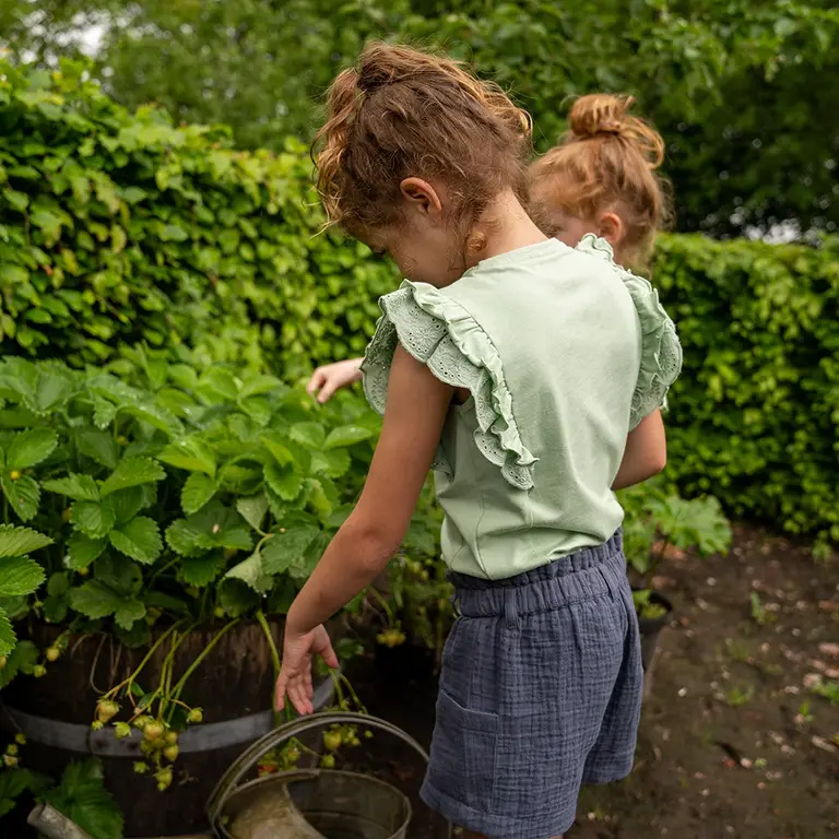T-shirt (light faded green)