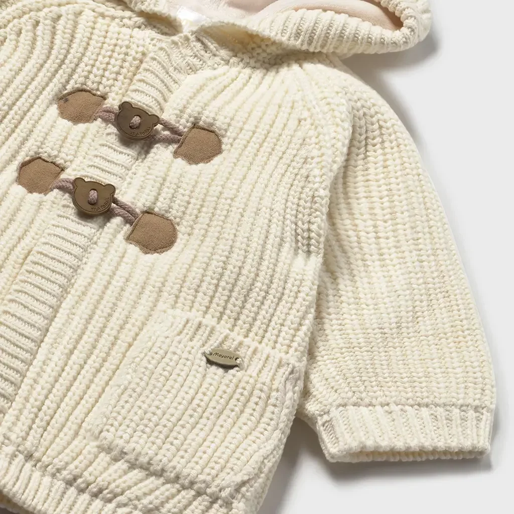 Gebreid jasje/vestje (pottery)