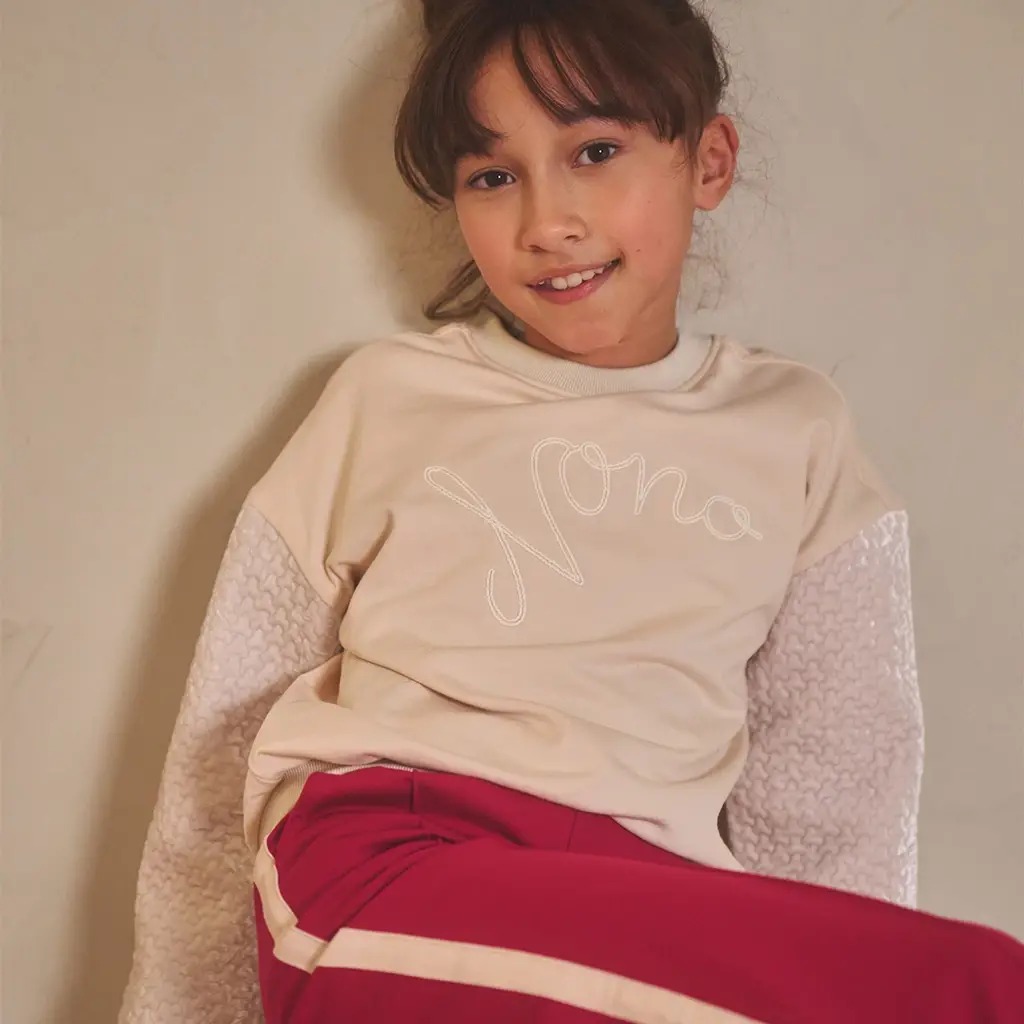 Trui Konono (pearled ivory)