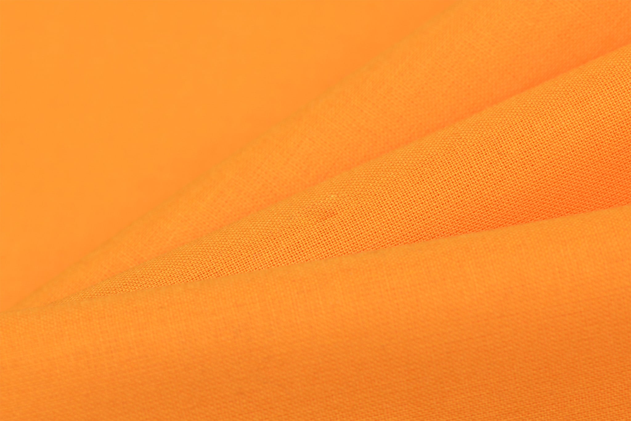 Uni Katoen Stof Licht Oranje – Zacht, Ademend & Veelzijdig