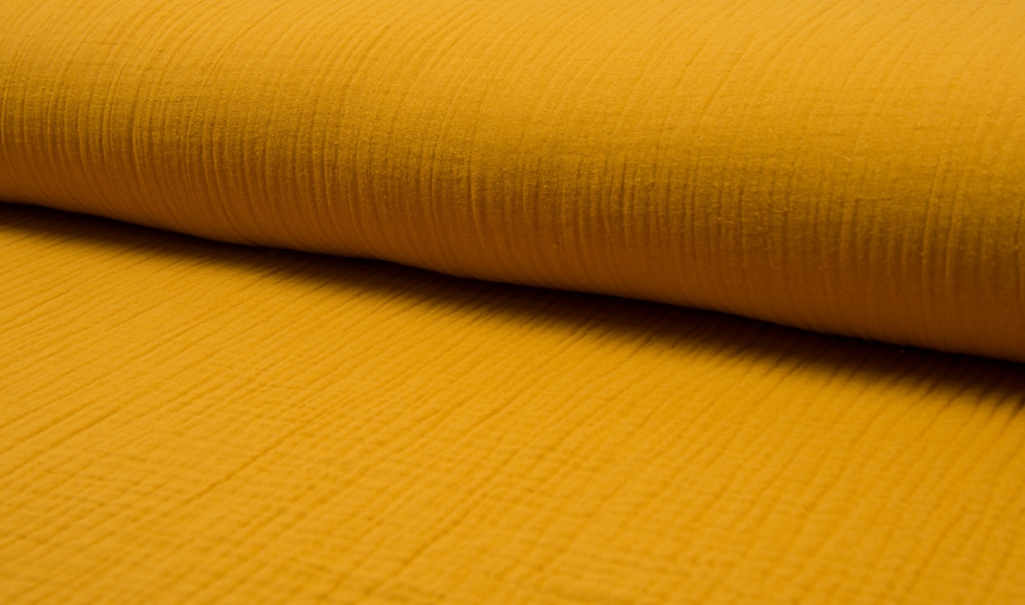 Hydrofiel Stof Oker – Zacht, Ademend en Duurzaam