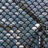 Lycra bedrukt met zilveren schubben