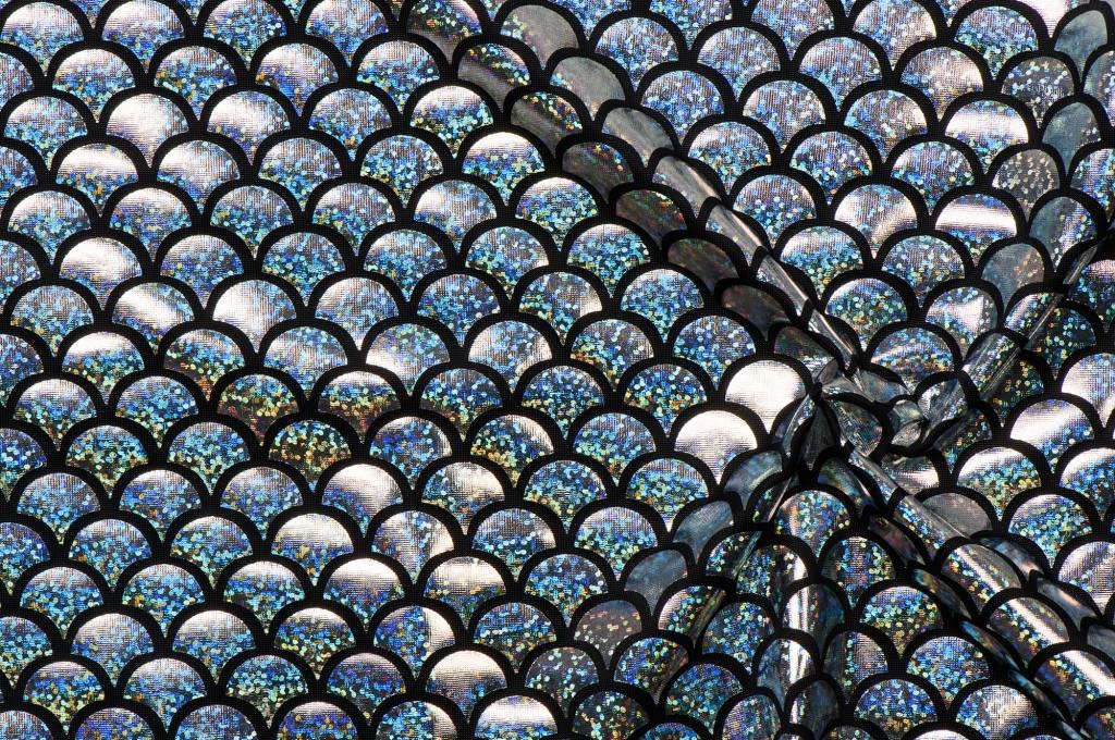 Lycra bedrukt met zilveren schubben