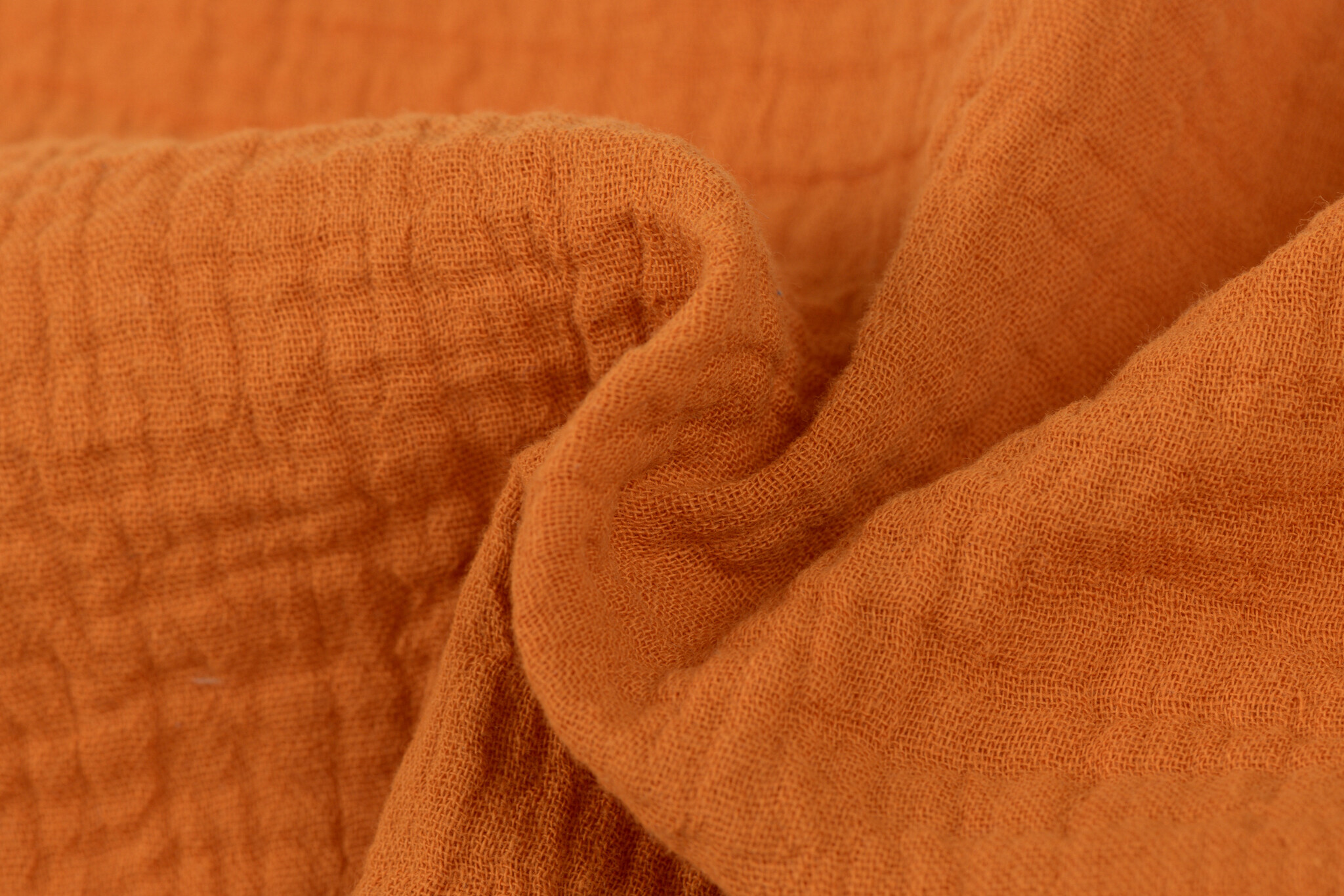 Hydrofiel Stof Dusty Oranje – Zacht, Ademend en Duurzaam