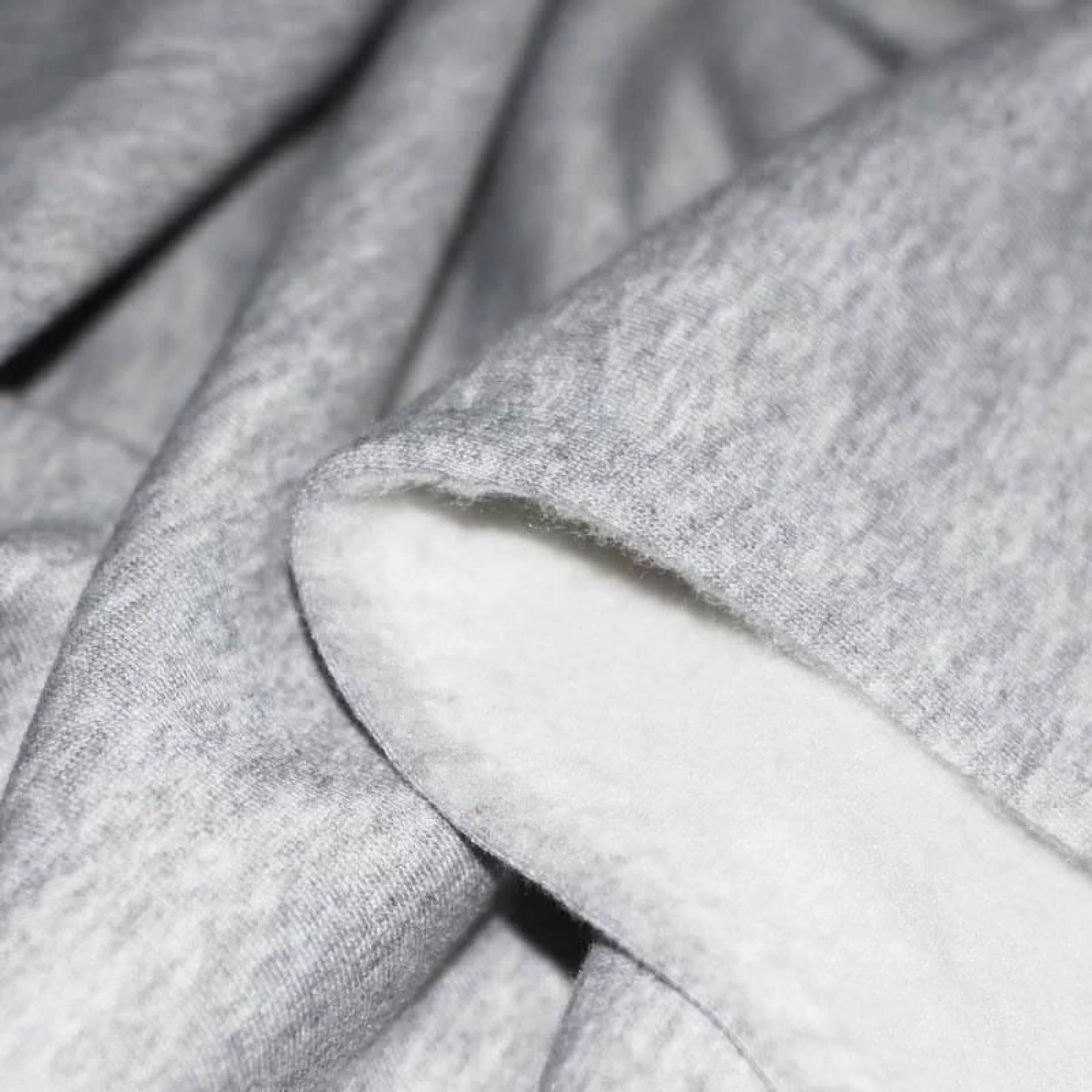 Joggingstof Gemeleerd Licht Grijs – Zacht, Warm & Comfortabel