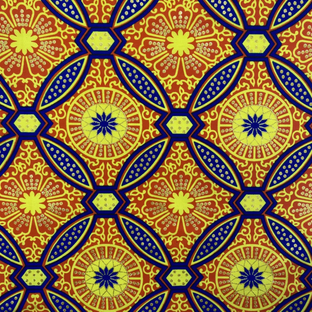 Wax Katoen Stof Sura Oranje – Afrikaanse Print met Metallic Accenten