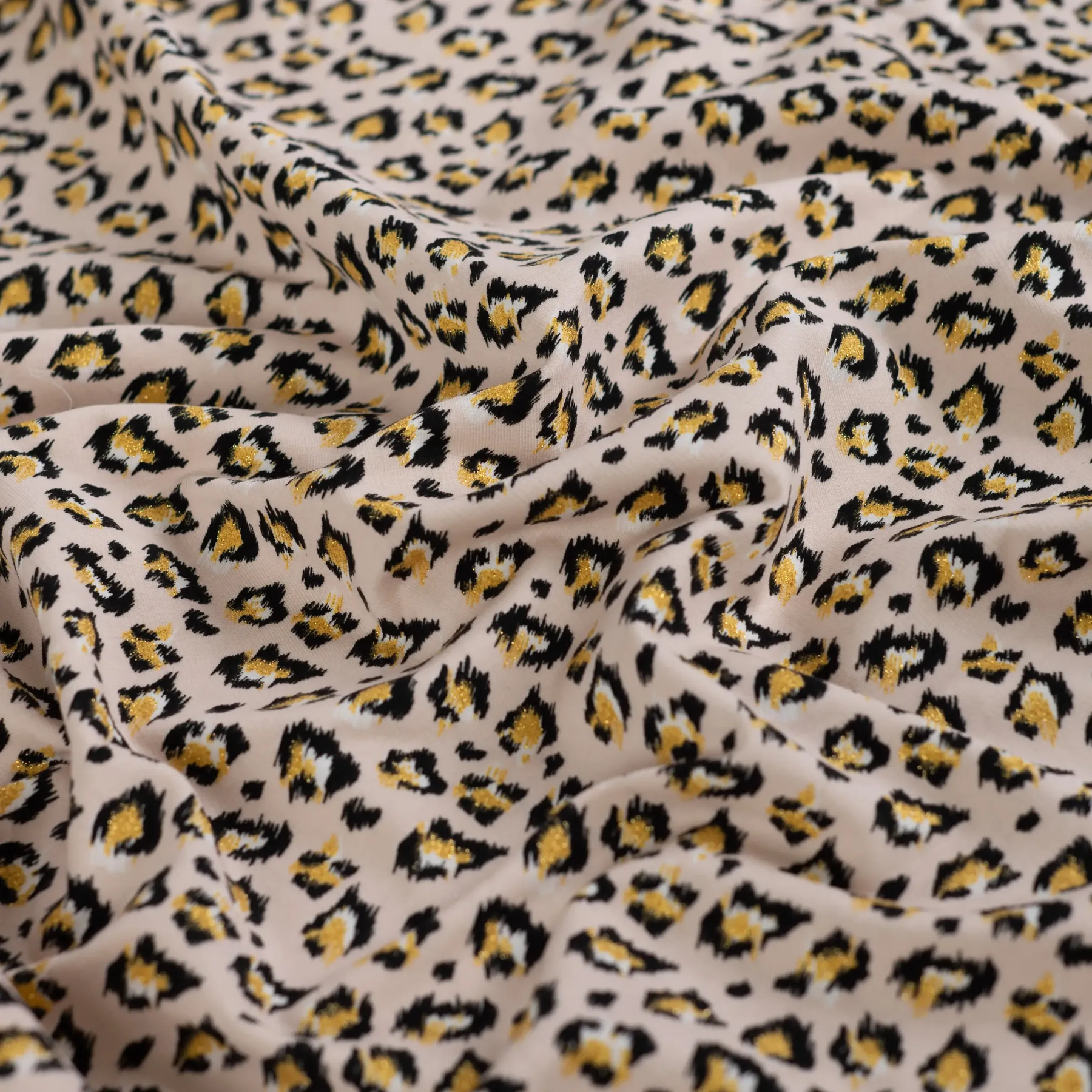 French Terry Stof Panterprint Zand – Speels met Gouden Glitter