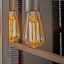 Lichtbron Edison LED filament goldline - E27 6W 2100K 450lm dimbaar / Amberkleurig glas