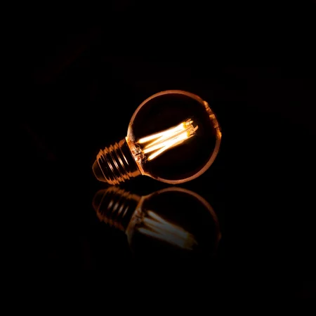 BelaLuz Lichtbron E27 LED 6W Ø6 cm Bol Filament Amber Dimbaar