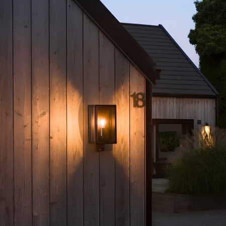 Konstsmide Moderne buiten wandlamp Carpi 1-lichts zwart met bewegingssensor