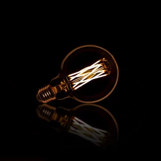 WoonStijl Lichtbron LED  bol Ø9 5 - E27 6W dimbaar / Amberkleurig glas 8466