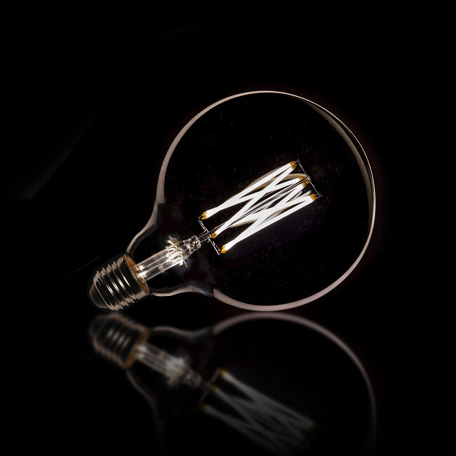 WoonStijl Lichtbron LED filament bol Ø12 5 - E27 6W 2100K 450lm dimbaar / Smoke grey glas