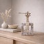 PTMD Ornament Aleria Beige dame met fluit op marmeren voetstuk