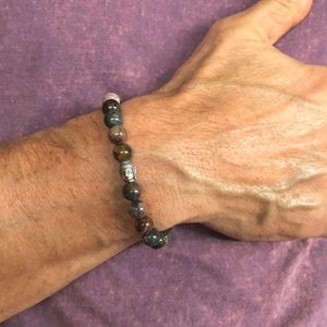 Kralenarmband met zilveren Buddha