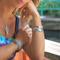 Zilveren klemarmband braided wave