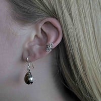 Zilveren earcuff Swirly