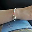 Armbandje cowrie shell pastel Armbandje cowrie shell pastel