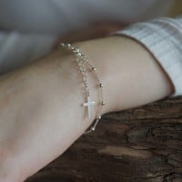 Zilveren armbandje cross dot