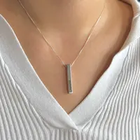 Totem Bar bedel gegraveerd