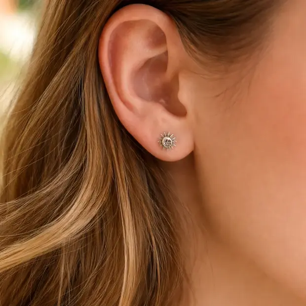 Zilveren oorknopjes zon