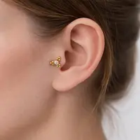 Piercing zirkonia big triangle gold dot