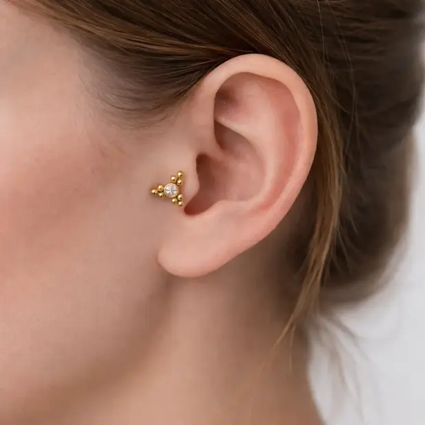 Piercing zirkonia big triangle gold dot
