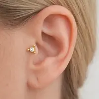 Piercing zirkonia triangle gold dot