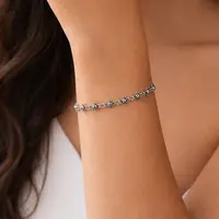 Zilveren armband met zonnetjes