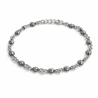 Zilveren armband met zonnetjes