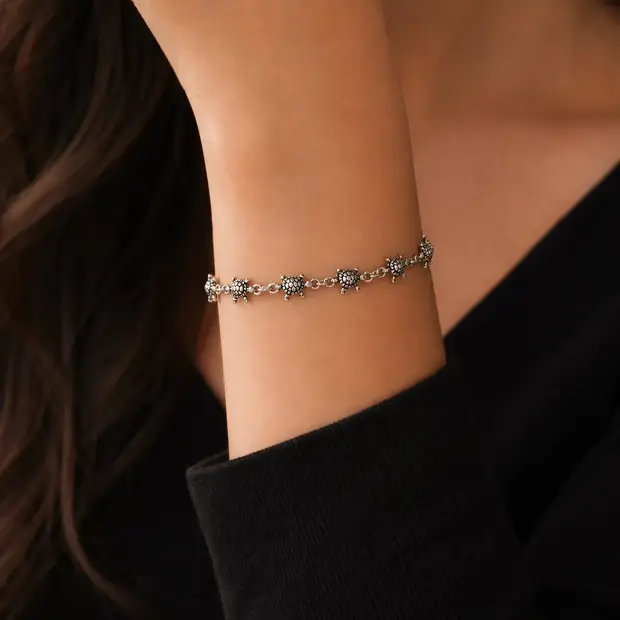 Zilveren armband met schildpadjes